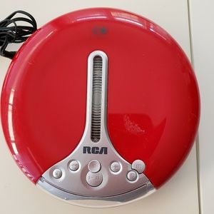 RCA CD player with ear buds.